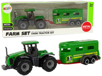 Groene tractor met aanhanger